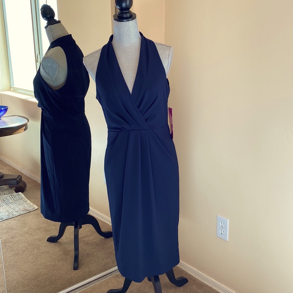 New with tags! Betsy Johnson Navy Dress. Very flattering fit/Sz 6. Lovely dress!